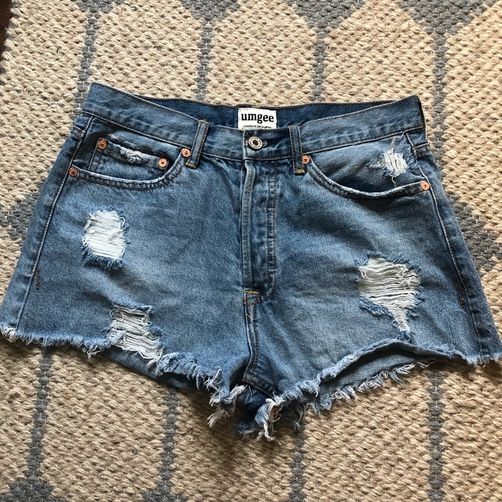 Distressed jean shorts, full button closure